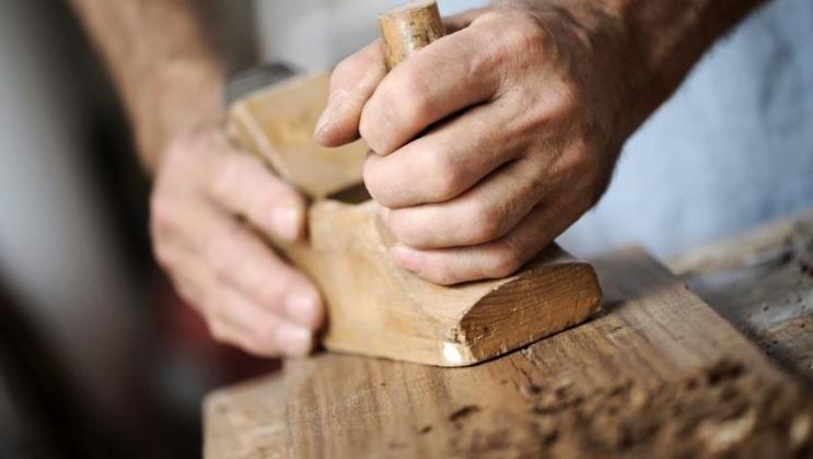 Hand-planing timber — carpentry detail