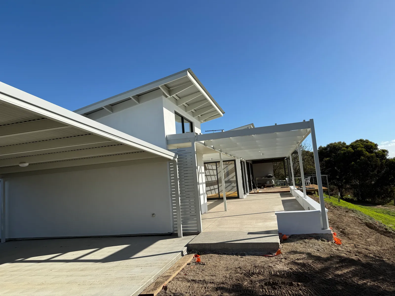 Completed home with covered alfresco and decking