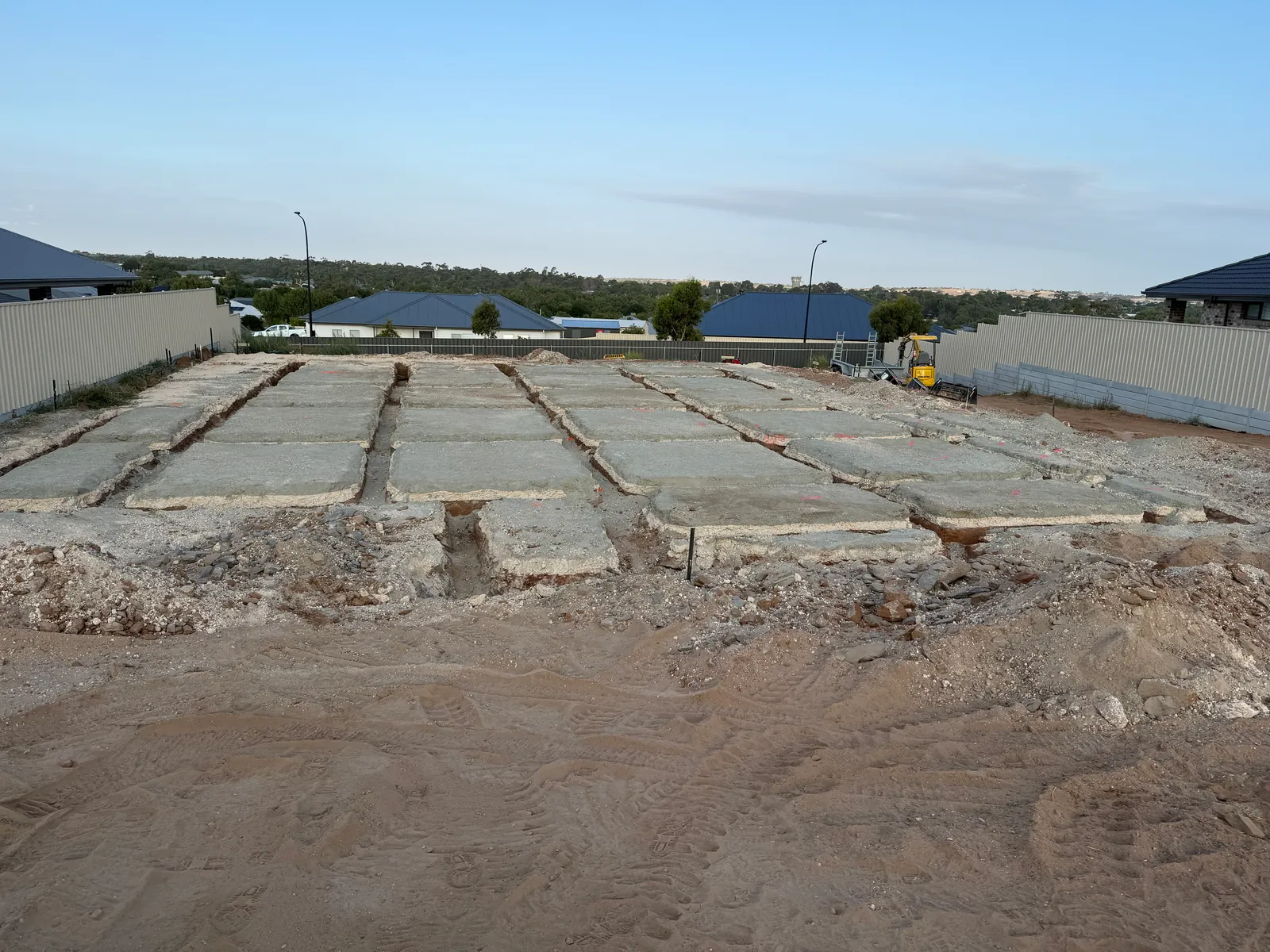 Concrete slab and footings poured on a prepared sloping block